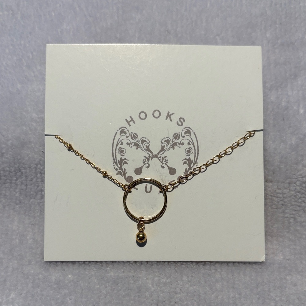 Elegant Gold Bracelet Hoop and Charm by Hooks & Luxe.